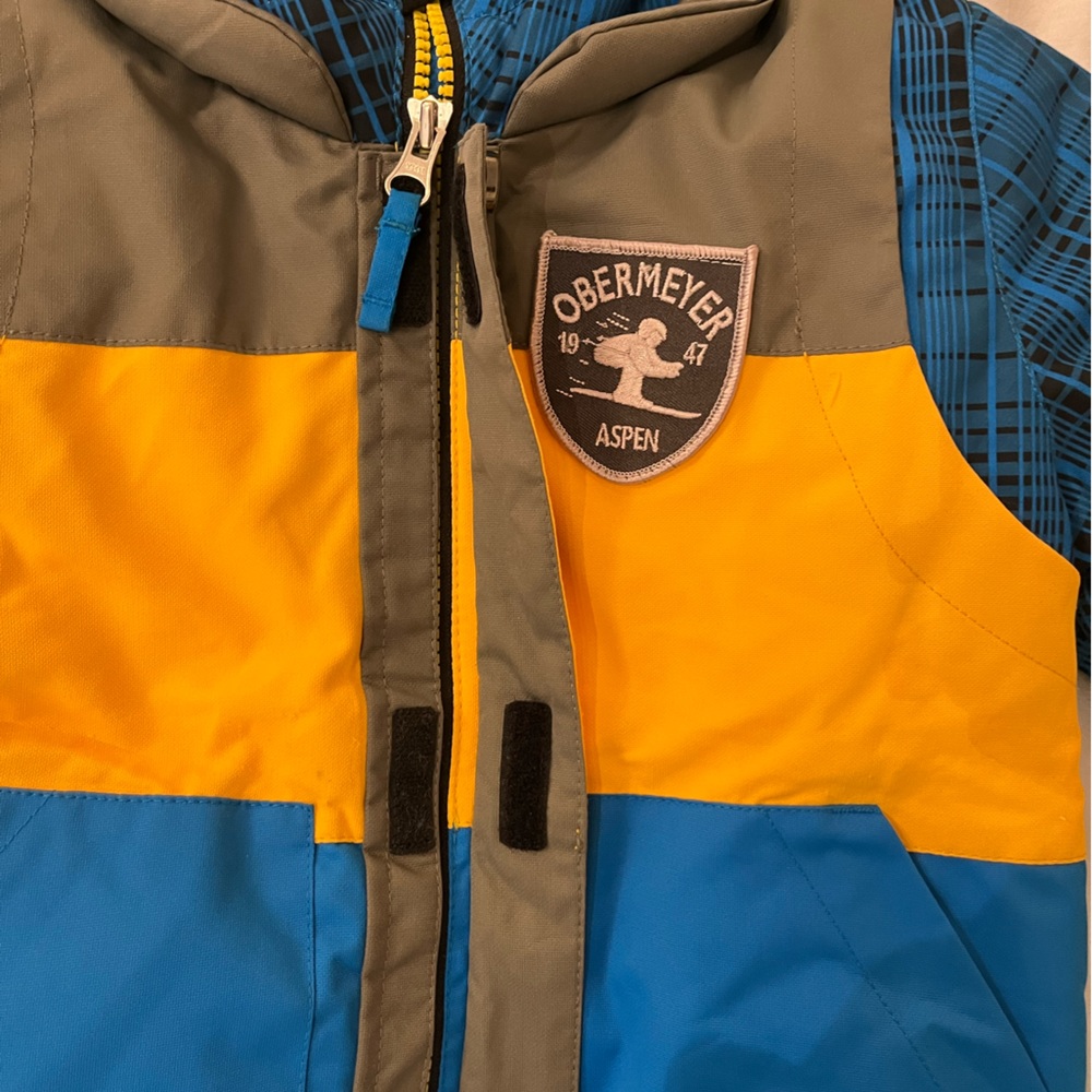 OBERMEYER blue ski jacket. Size 3.Very good condition. Used only a few times.